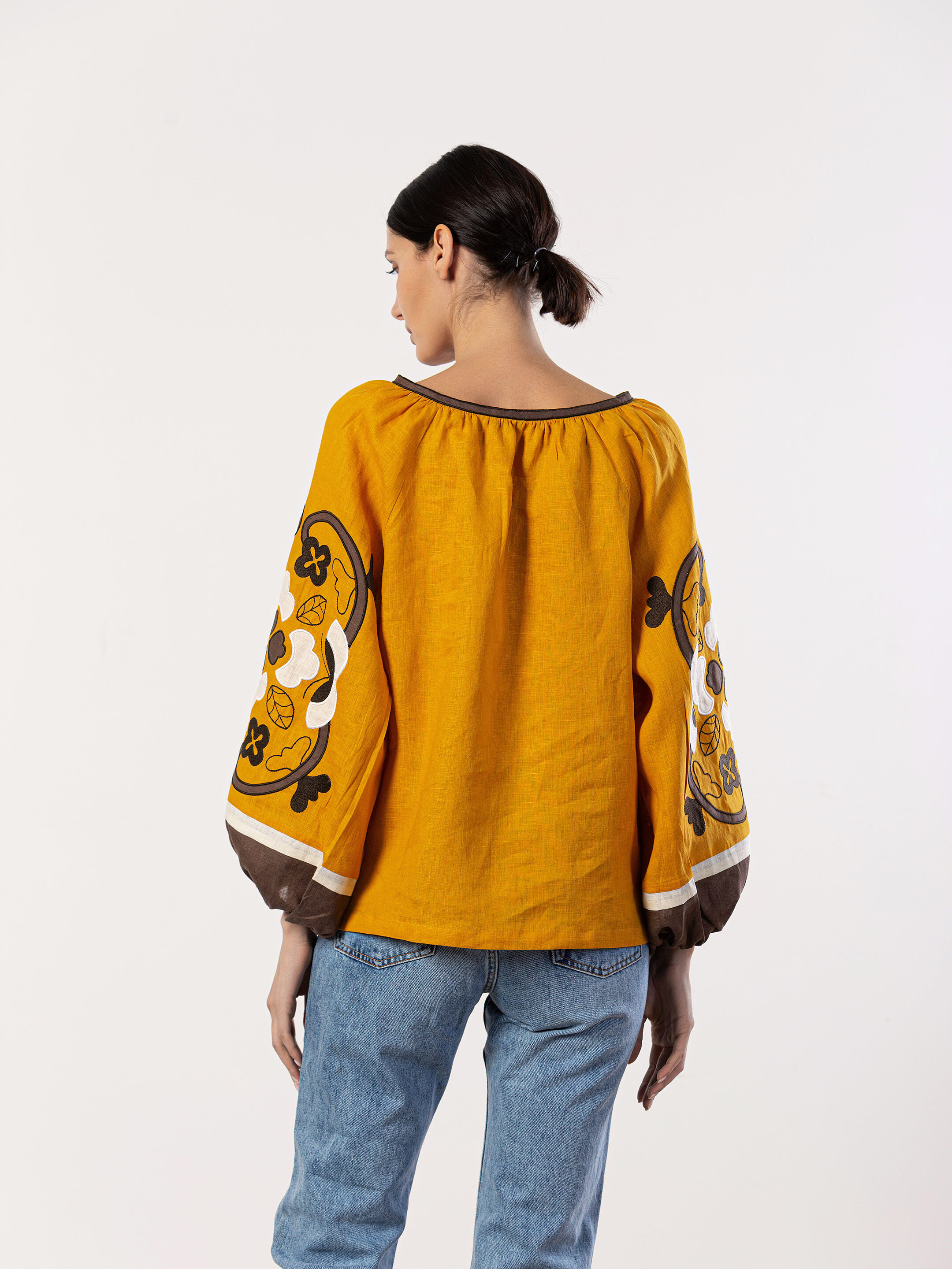 Embroidered shirt in yellow linen Sunny photo