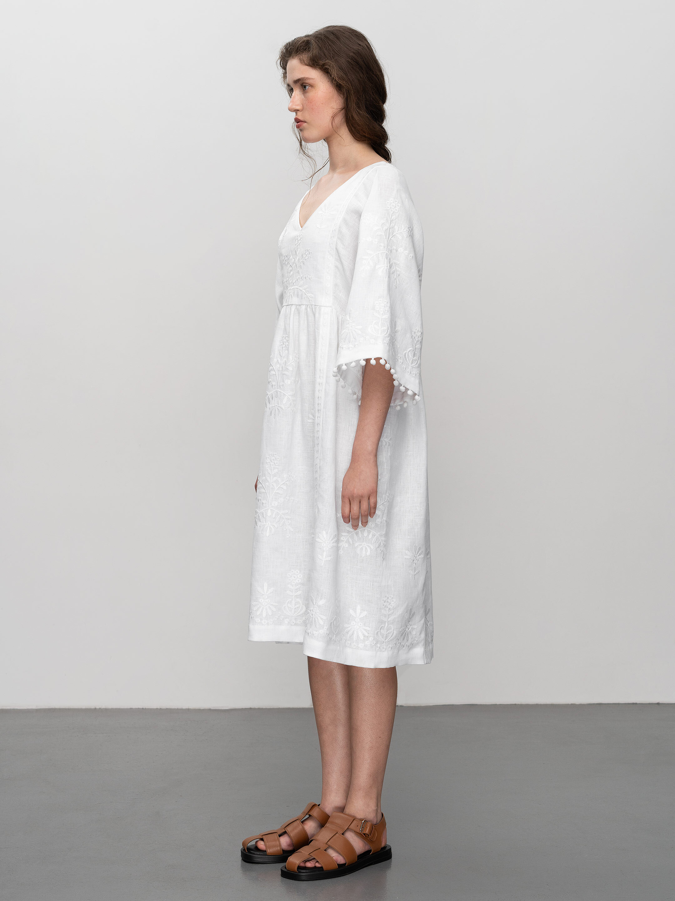 White easy linen dress with floral embroidery Virgin photo
