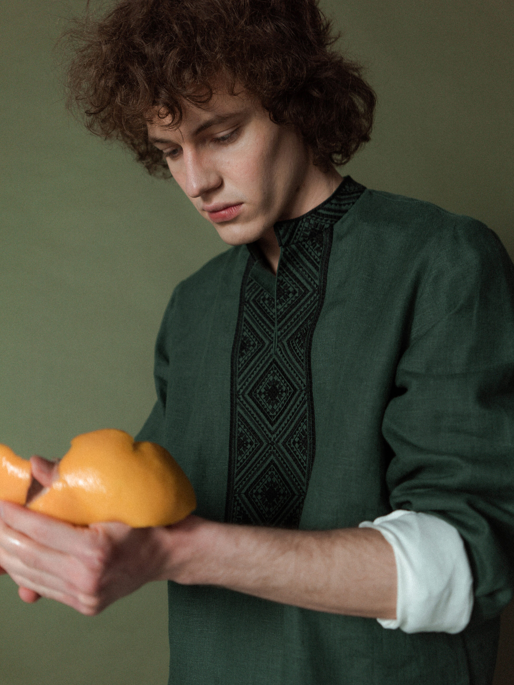 Men's shirt from green linen with embroidery Troyan in Ukraine
