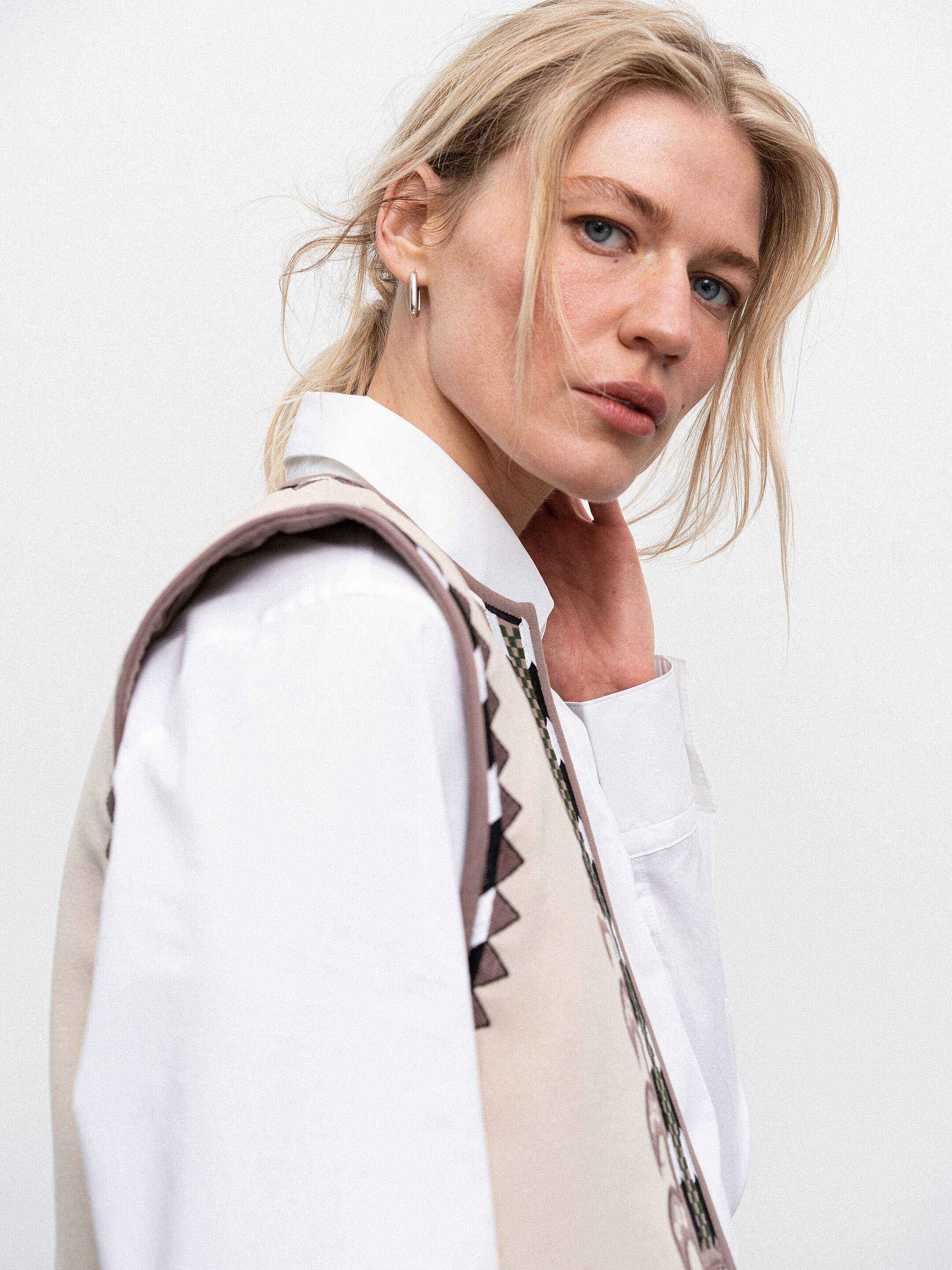 Vest with embroidery and appliqué Folk fitting