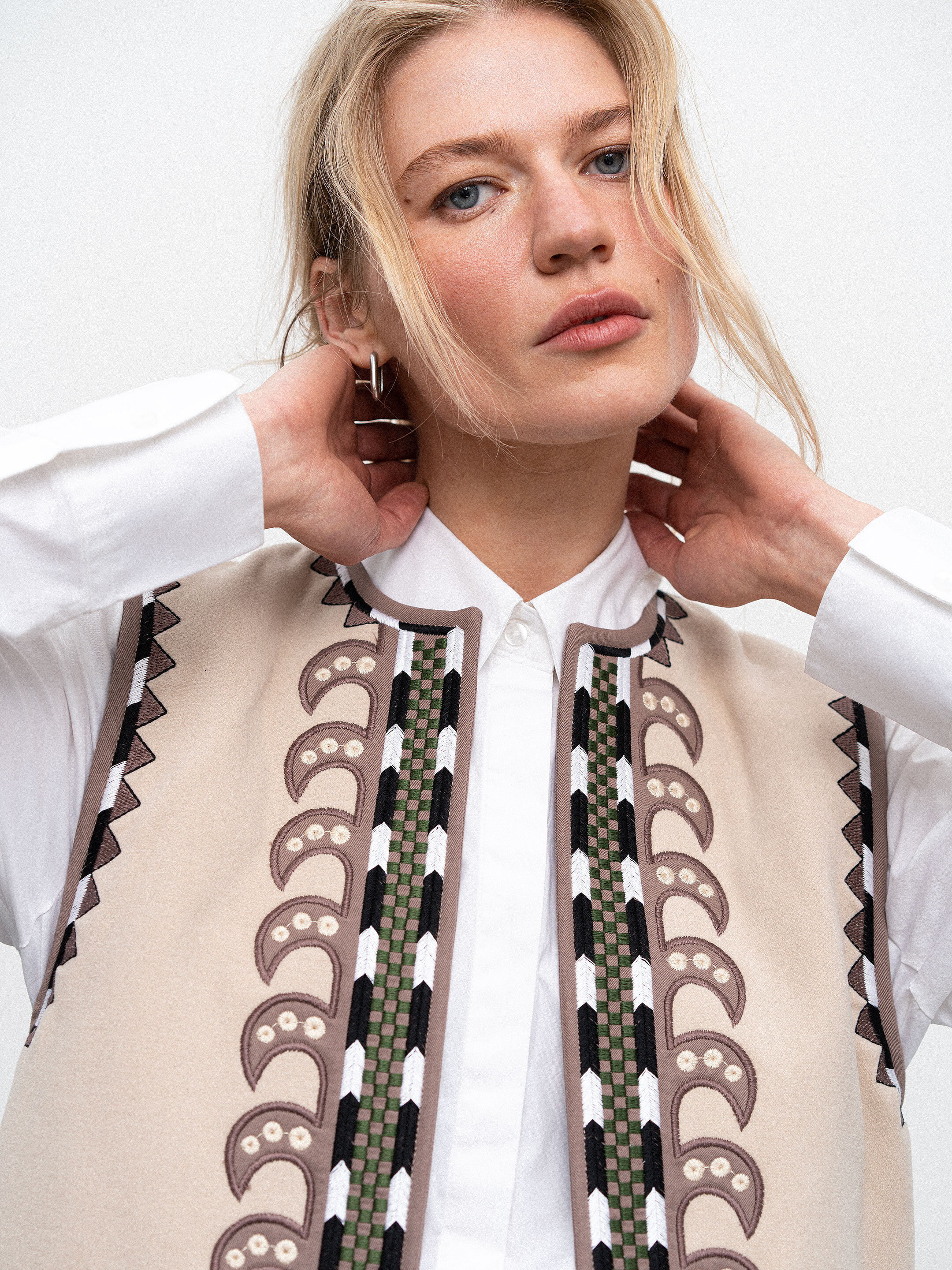 Vest with embroidery and appliqué Folk photo