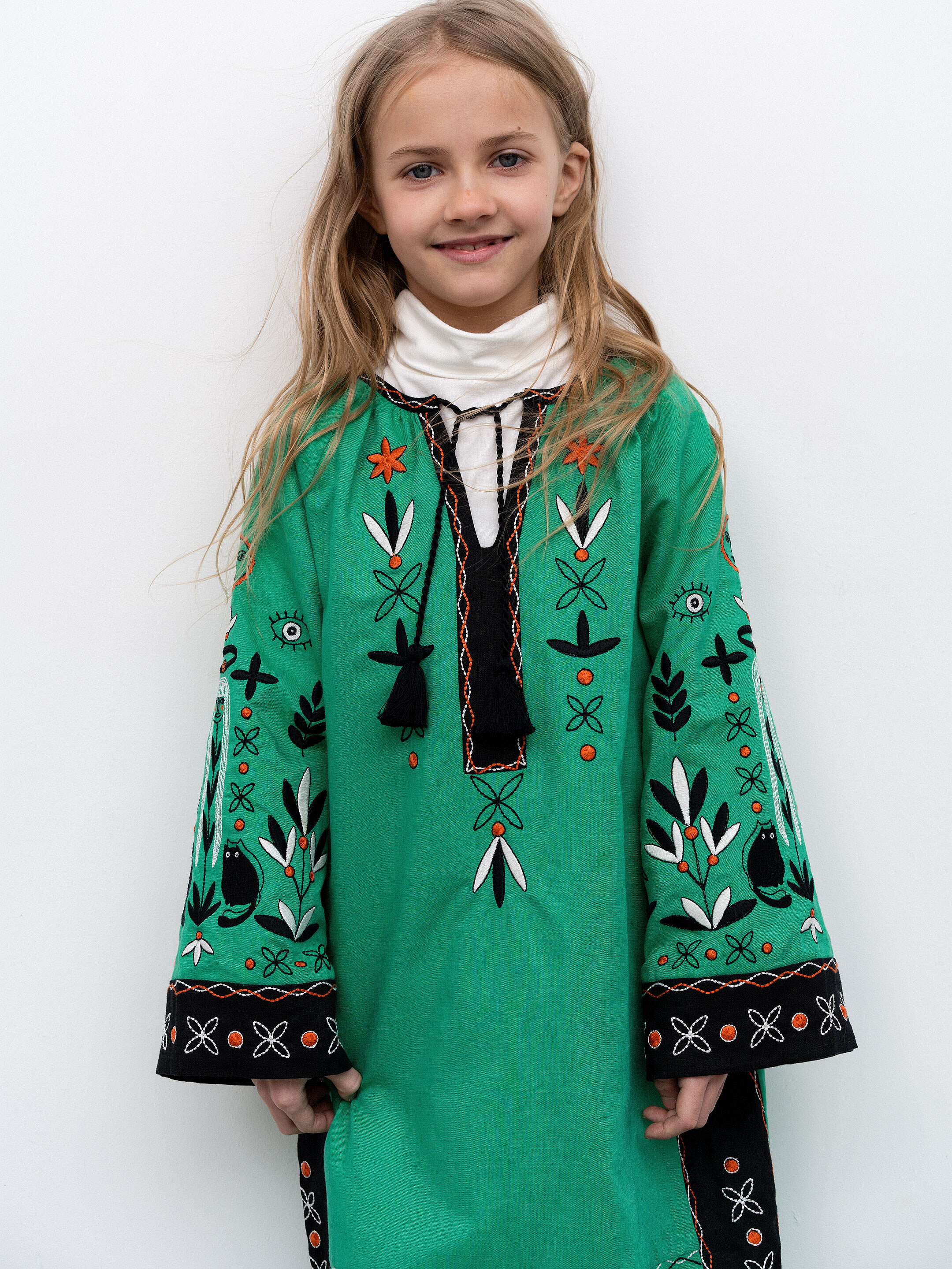 Divchyna Trostynka embroidered children's dress fitting