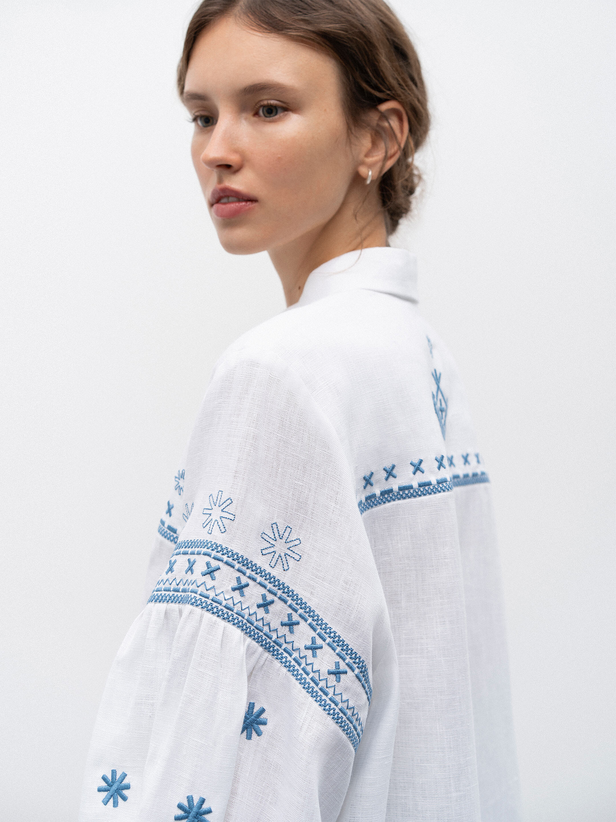 White linen shirt with embroidery Tsvit Syniy fitting