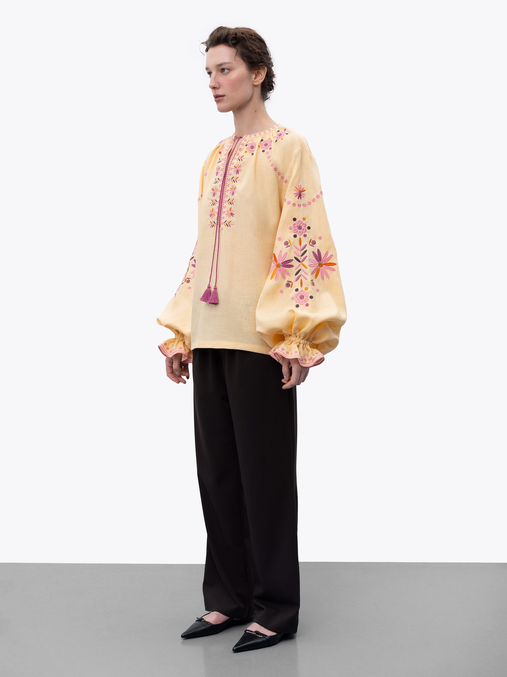 Voluminous embroidered blouse with floral ornaments April fitting