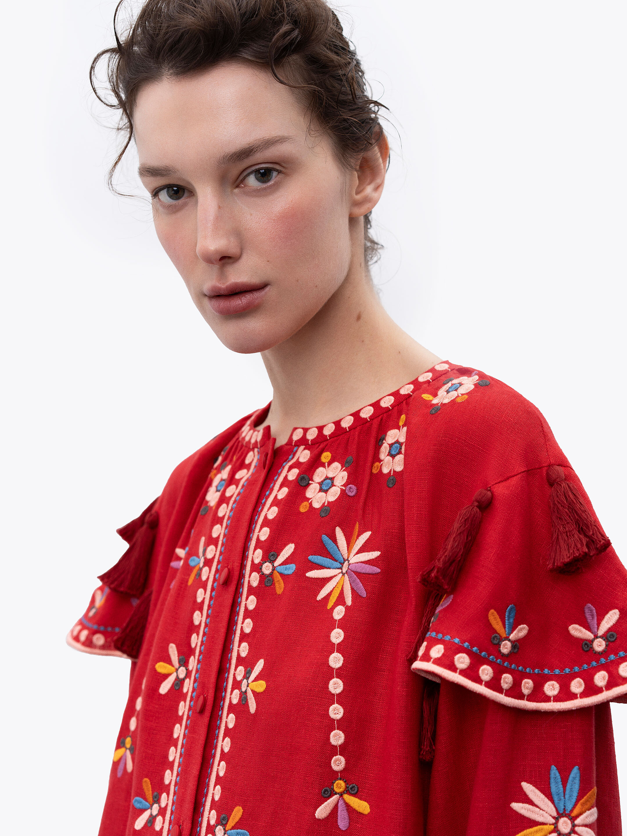 Red linen embroidered dress with floral motifs and tassels Vesnyanka Chervona in Ukraine