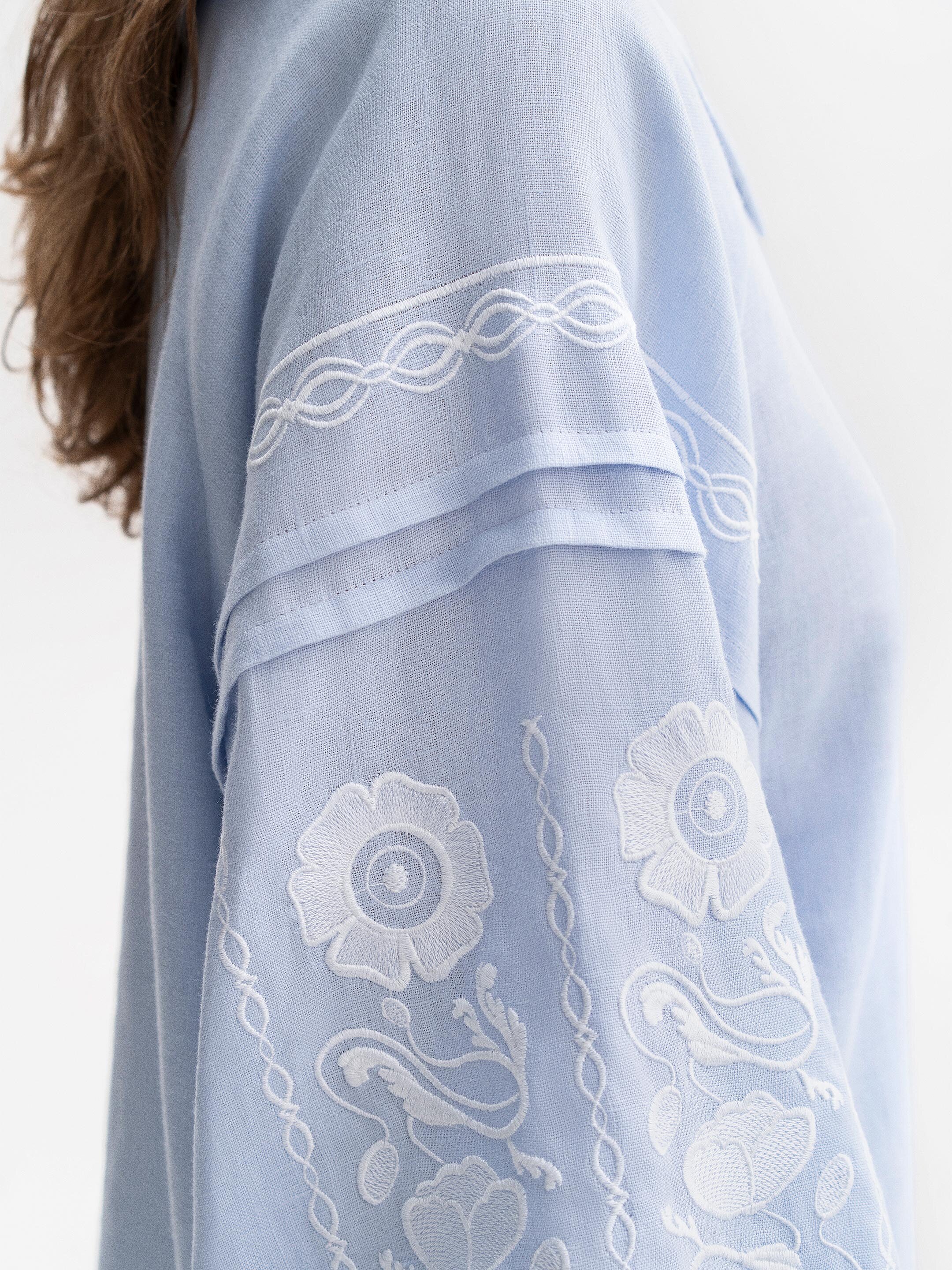 Soft blue shirt with white embroidery Dnieper in Ukraine