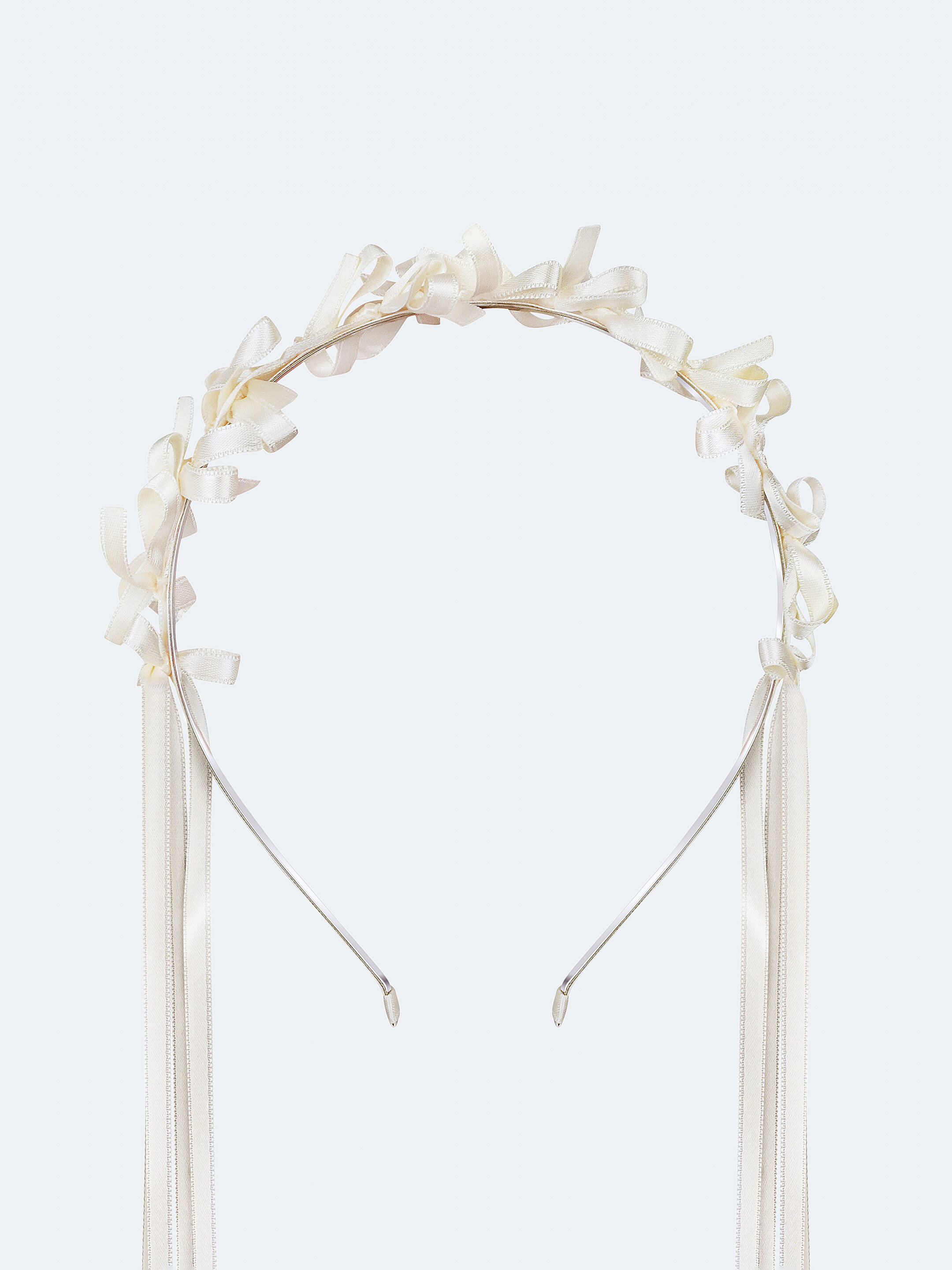 Light summer wreath made of milk-colored satin thread "Lebidka" in Ukraine
