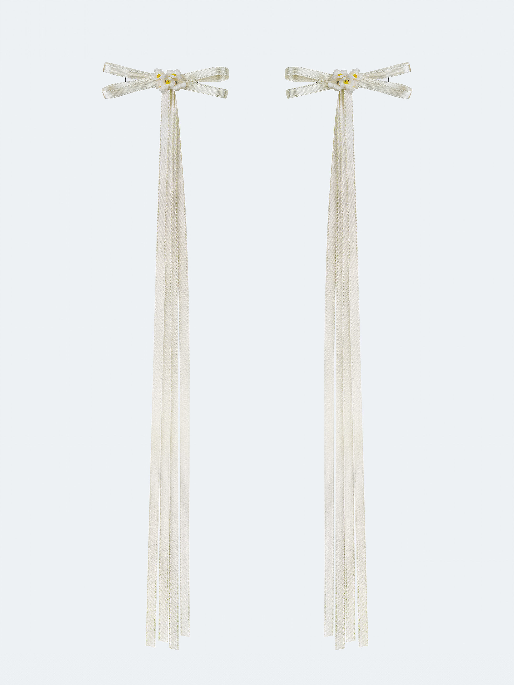 A pair of ribbons-barrettes of milk color "Tsarivna" photo