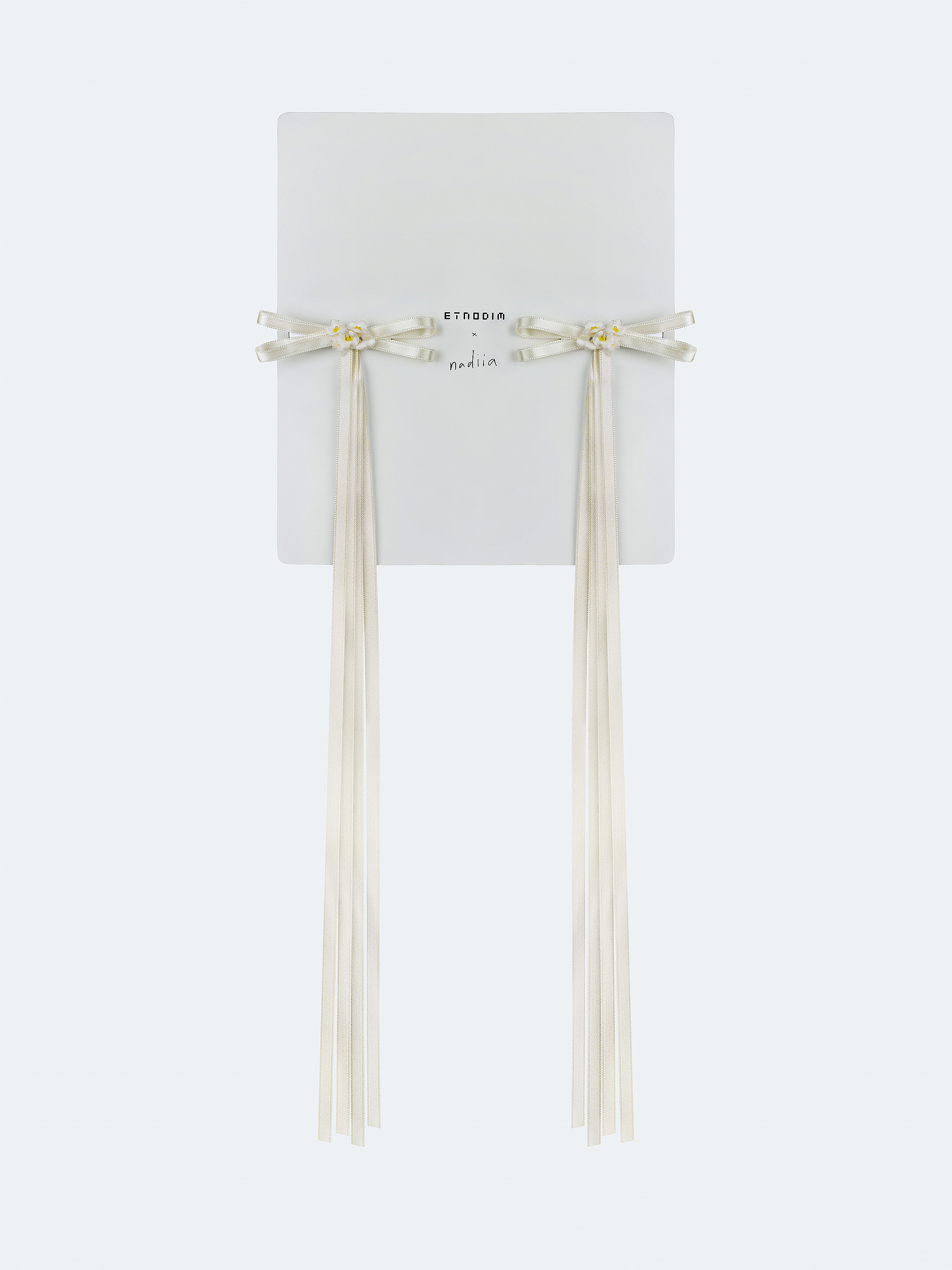A pair of ribbons-barrettes of milk color "Tsarivna" ціна