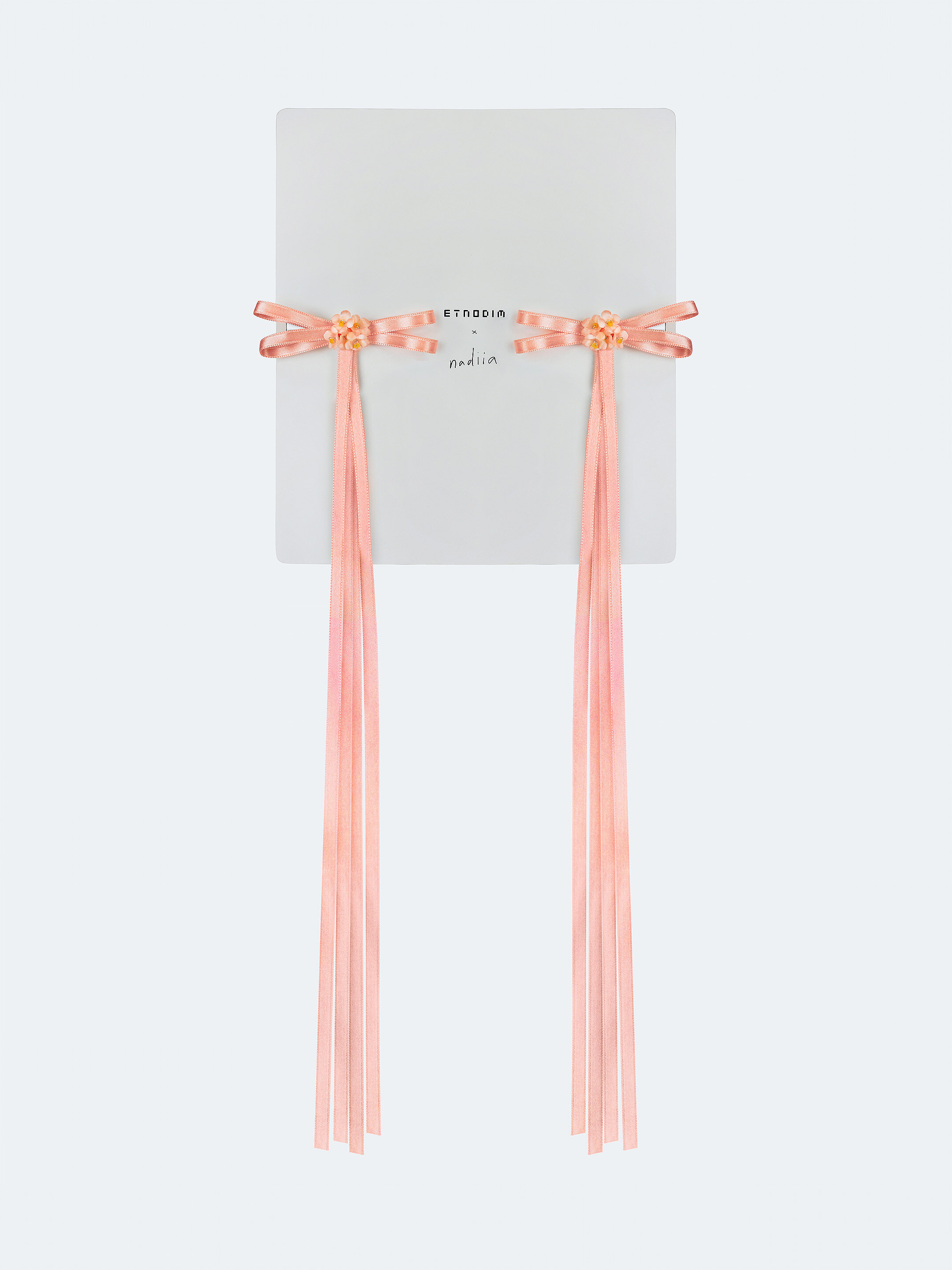 A pair of ribbons-barrettes of peach color "Tsarivna" ціна
