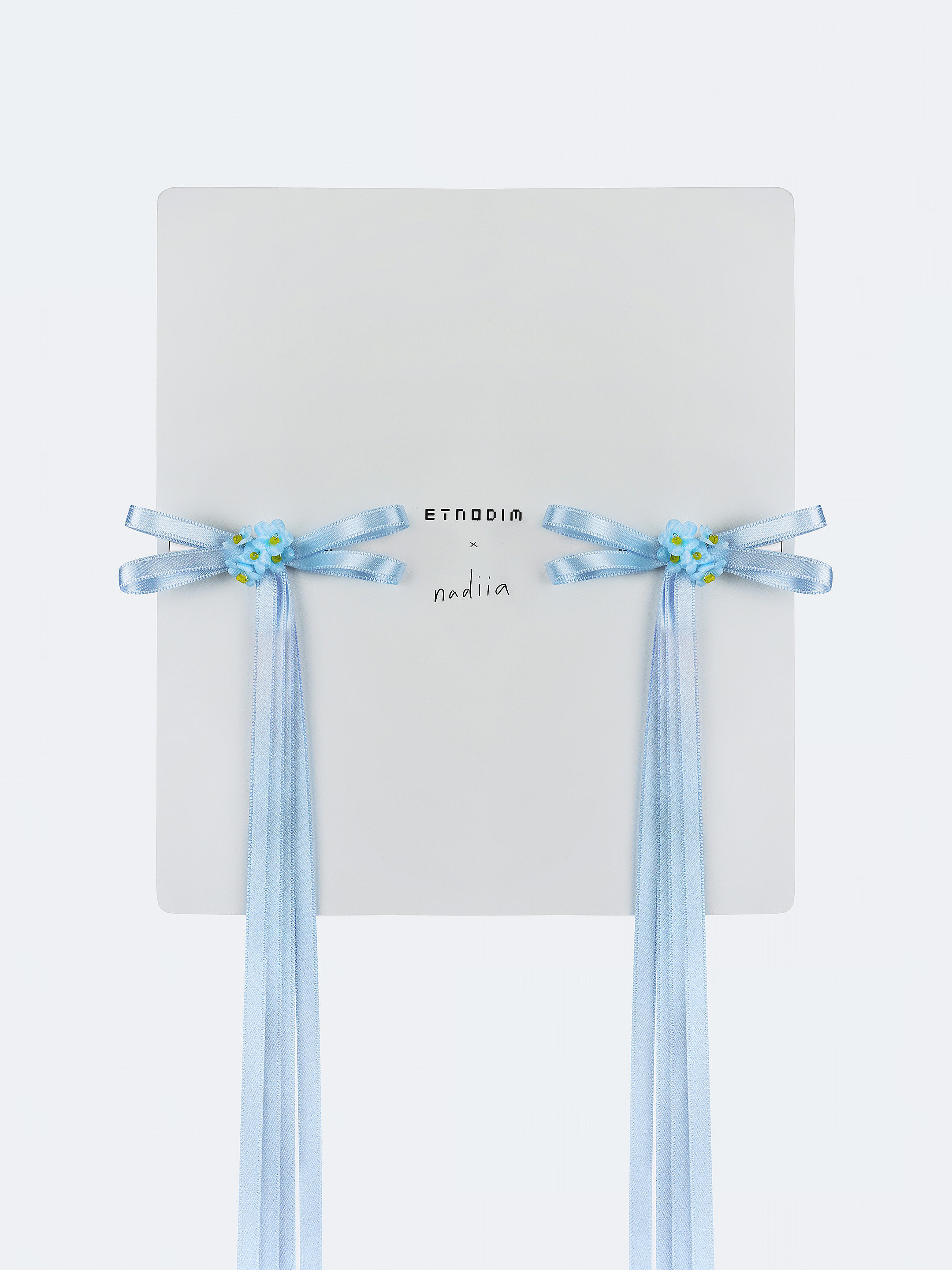 A pair of ribbons-barrettes of white color "Tsarivna" ціна