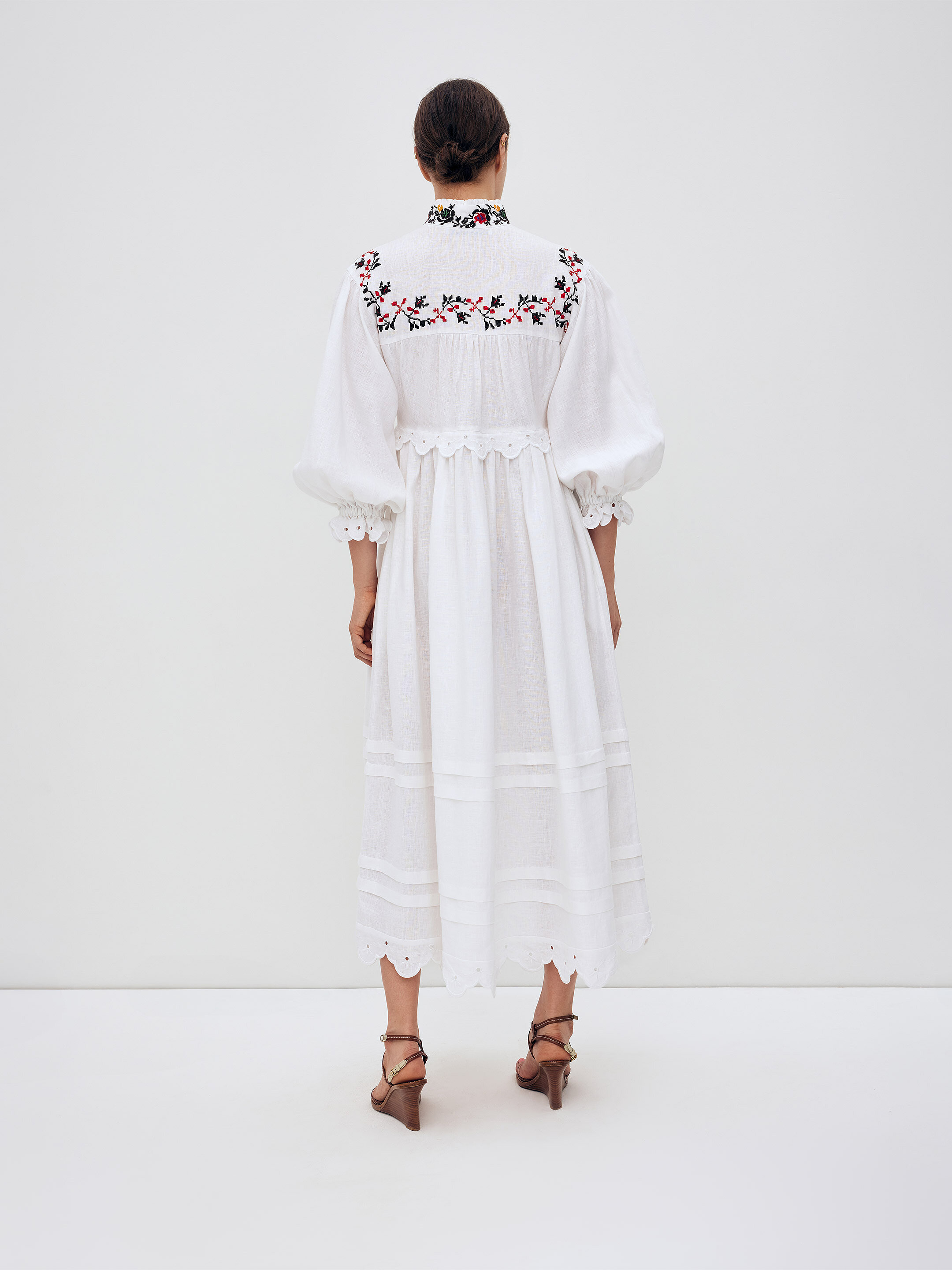 Long embroidered dress with a high neck "Korolivna" fitting