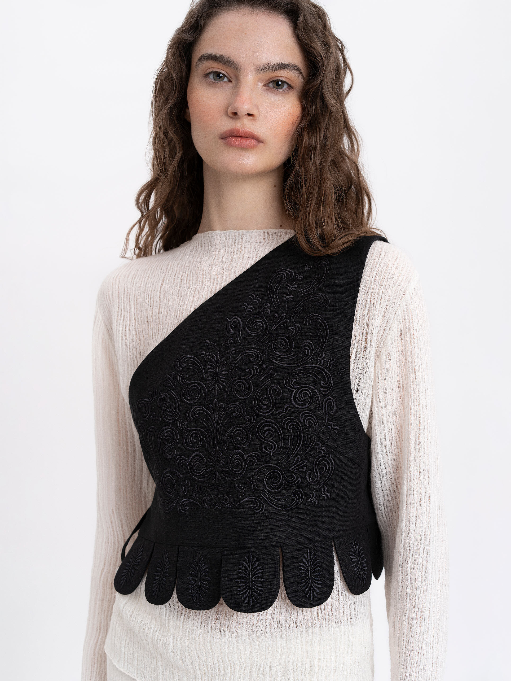 Asymmetric vest with black embroidery in tone "Osiayna" ціна