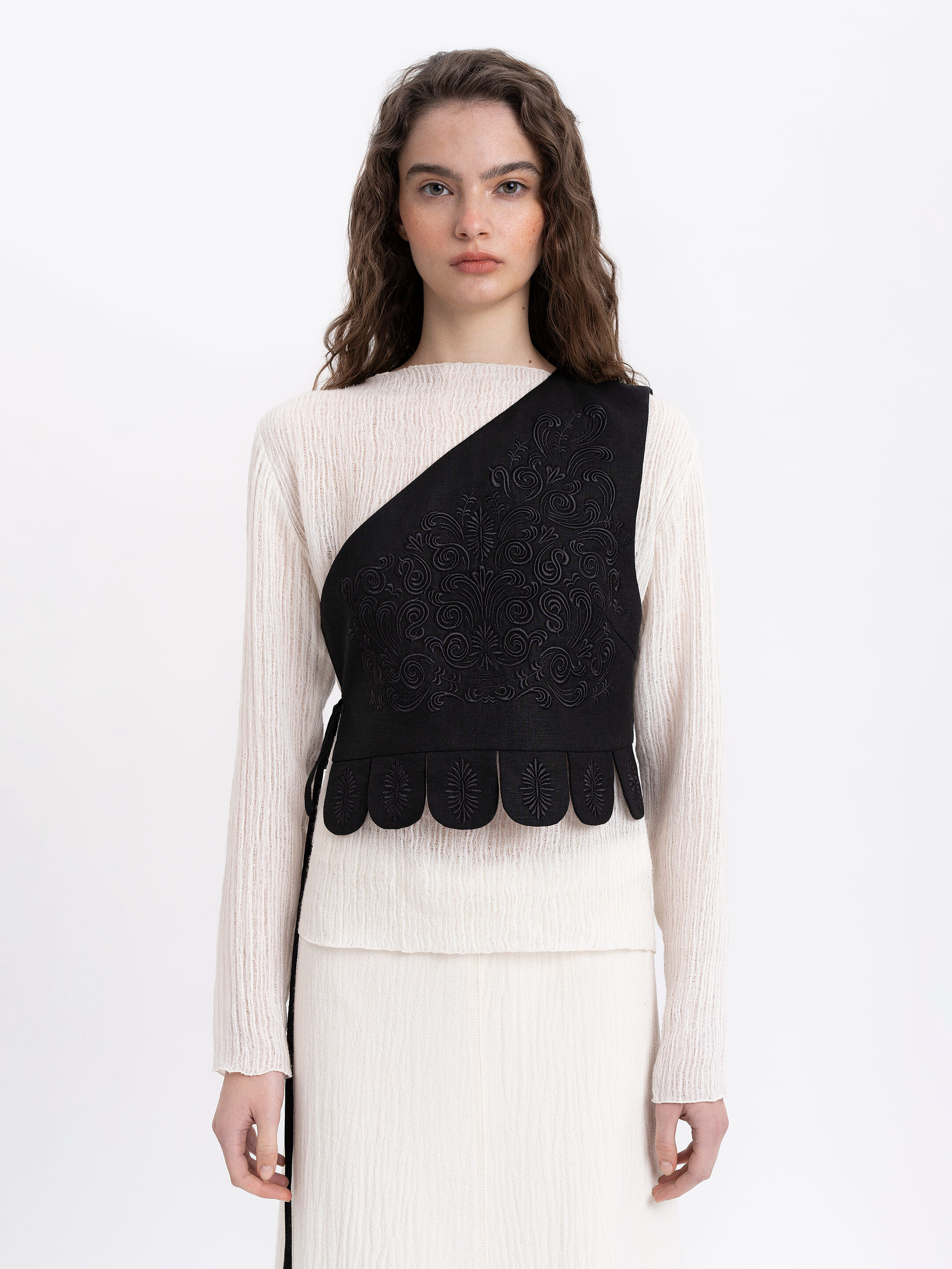 Asymmetric vest with black embroidery in tone "Osiayna" Buy