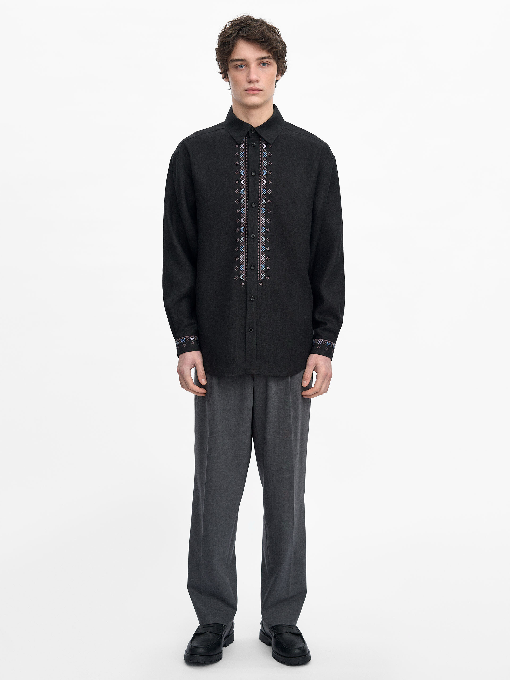 Mandrivnyk dark shirt in Ukraine